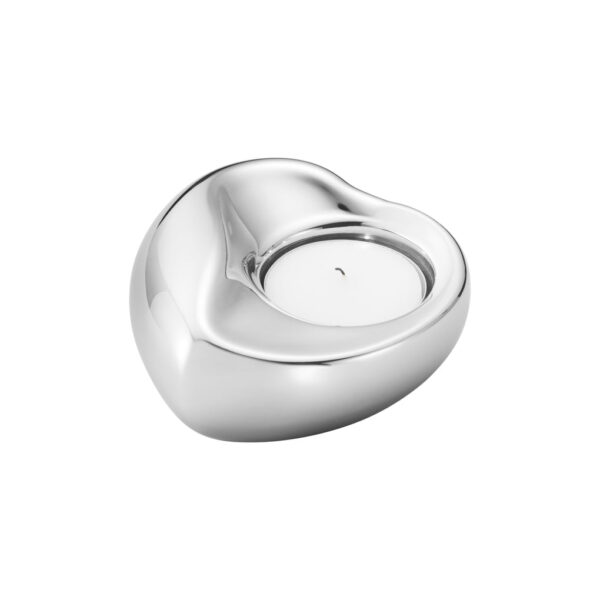 Georg Jensen - Hjerte fyrfadsstage - sølv - Interiør > Lys & lysestager > Fyrfadsstager  Elegant og hjerteformet fyrfadsstage fra Georg Jensen. Stagen er fremstillet i blankt rustfrit stål