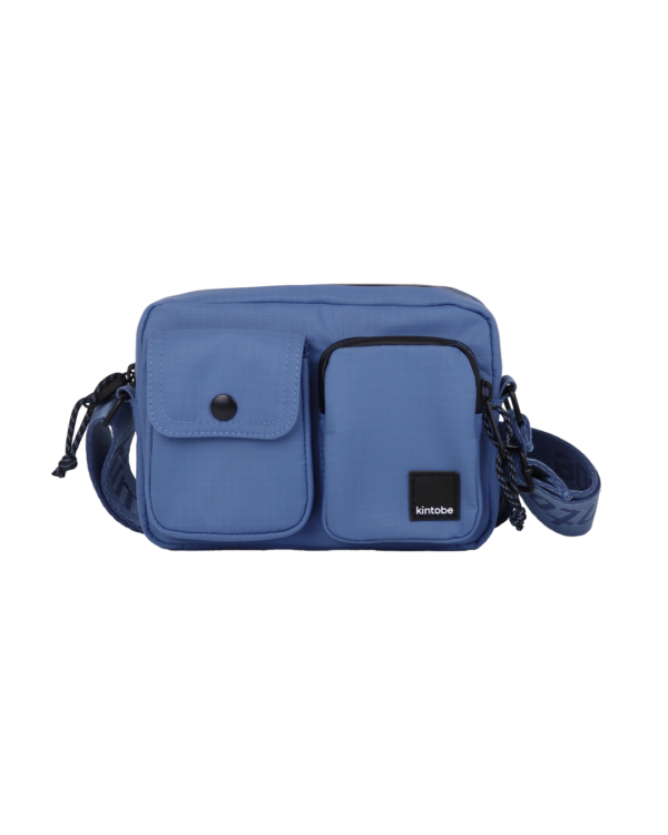 Kintobe - Mini Miles crossbodytaske - Storm Blue - Tasker > Crossbody tasker > Crossbody tasker  Lækker mini crossbodytaske med justerbar strop. Tasken har to lommer foran